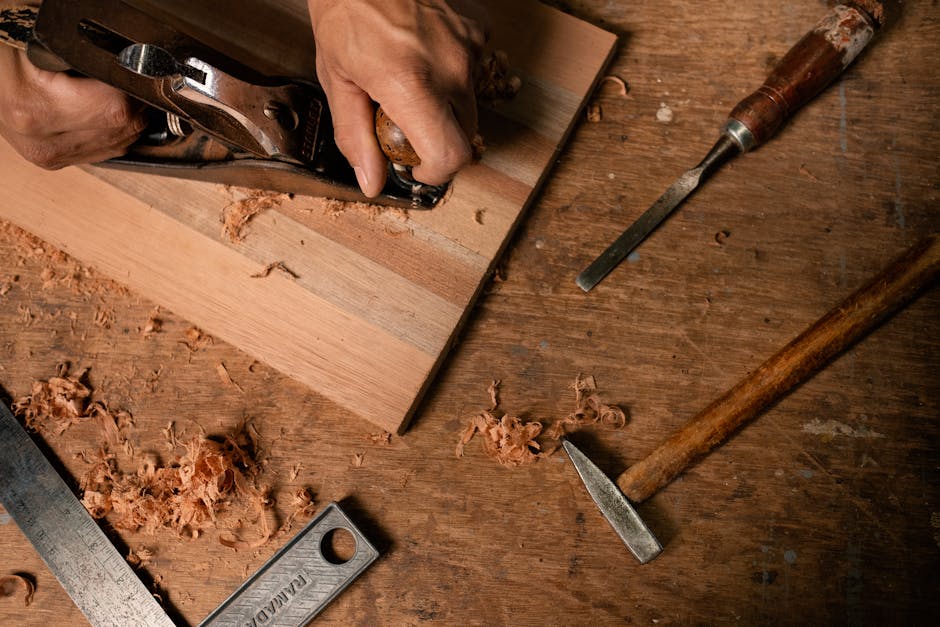Woodworker meticulously crafting bespoke furniture